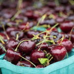 Cherries in container at farmers market