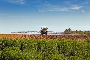 Agricultural sprayer in the field