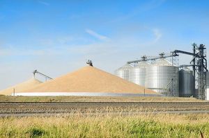 Grain Elevator with pile of grain