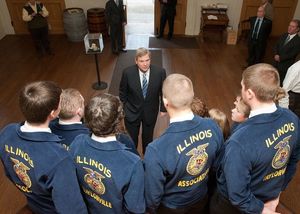 Tom Vilsack addressing group of FFA students